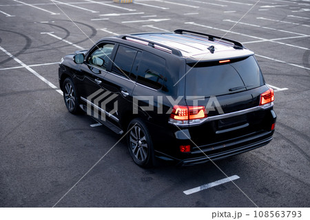 Luxury black car on a parking lot 108563793