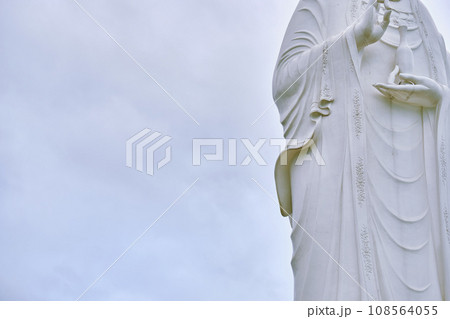 A close-up statue of the Lady Buddha at the Lin Ung Buddhist Temple on the Seoncha Peninsula near Da Nang, Vietnam. A close-up statue of the Lady Buddha at the Lin Ung Buddhist Temple on the Seoncha Peninsula near Da Nang, Vietnam. 108564055