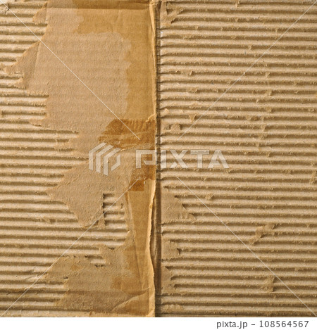 Brown and beige colored corrugated cardboard detail Brown and beige colored corrugated cardboard detail 108564567