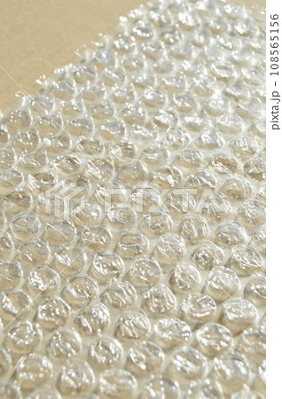 On corrugated cardboard paper plastic air bubble protection foil wrap texture background On corrugated cardboard paper plastic air bubble protection foil wrap texture background 108565156