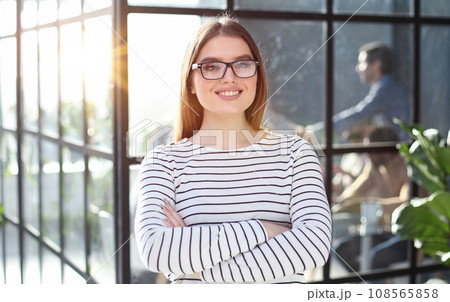 Portrait of a young business woman in an office 108565858