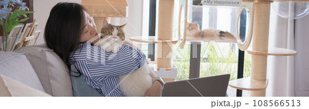web banner pet lover concept by asian woman she work and play with her cat web banner pet lover concept by asian woman she work and play with her cat 108566513