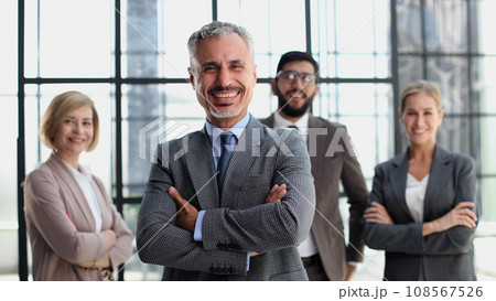 Group of business people with businessman leader on foreground Group of business people with businessman leader on foreground 108567526