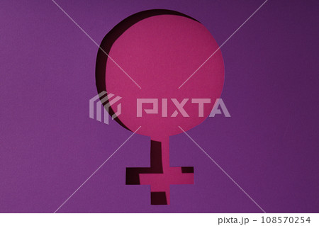 Female symbol on purple background, elimination of domestic violence. Female symbol on purple background, elimination of domestic violence. 108570254