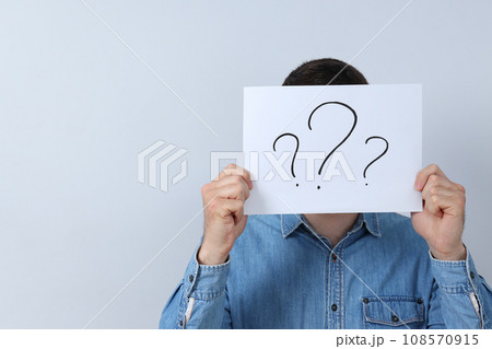 Man with paper in hands on white background, space for text Man with paper in hands on white background, space for text 108570915