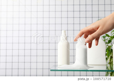 Hygiene products in the bathroom on a light background Hygiene products in the bathroom on a light background 108571710