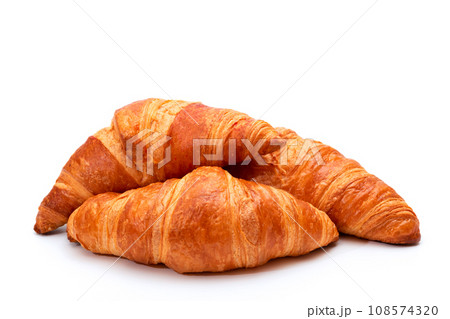 Fresh crispy croissants on a white background. French pastries 108574320