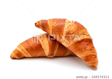 Fresh croissants on a white background close-up. French pastries Fresh croissants on a white background close-up. French pastries 108574321