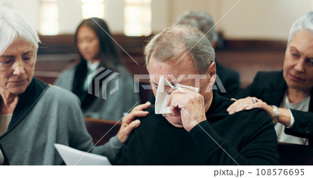 Sad, funeral and elderly man crying in church for God, holy spirit or religion in Christian community cathedral. Tissue, grief or support for upset senior person in chapel for emotional pain and loss 108576695