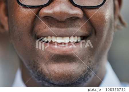 close-up of the face of a smiling African American man 108576732