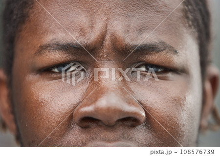 close-up of the face of a smiling African American man 108576739