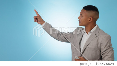 Weather forecast, pointing or man talking with hands for mockup space on blue background. Reporter, anchor or presenter in broadcast for presentation, climate change prediction or news in studio 108578824