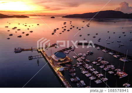 Aerial view of Chalong Pier during sunrise in Phuket, Thailand Aerial view of Chalong Pier during sunrise in Phuket, Thailand 108578941