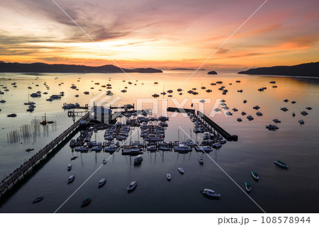 Aerial view of Chalong Pier during sunrise in Phuket, Thailand Aerial view of Chalong Pier during sunrise in Phuket, Thailand 108578944
