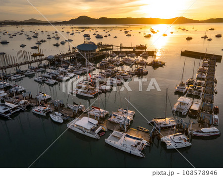 Aerial view of Chalong Pier during sunrise in Phuket, Thailand Aerial view of Chalong Pier during sunrise in Phuket, Thailand 108578946
