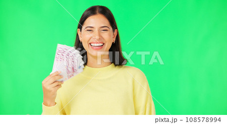 Money winner, portrait or happy woman on green screen with lottery jackpot, competition giveaway. Goal, success or excited rich female person with Euros or gambling cash prize on studio background Money winner, portrait or happy woman on green screen with lottery jackpot, competition giveaway. Goal, success or excited rich female person with Euros or gambling cash prize on studio background 108578994