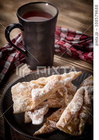 Faworki - traditional Polish crispy dessert. 108579688