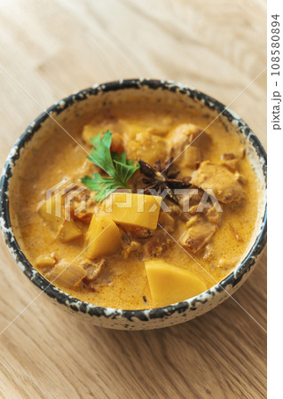 Curry chicken food. Indian masala butter chicken curry on table. Indian kitchen food concept Curry chicken food. Indian masala butter chicken curry on table. Indian kitchen food concept 108580894