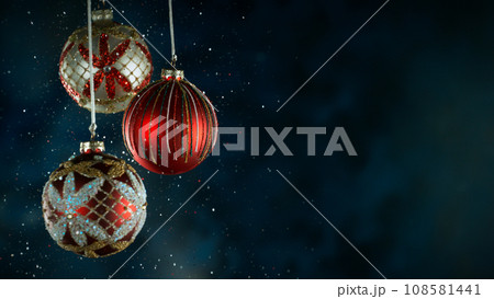 Decorative Christmas Balls with Bokeh Lights and Glitters Falling 108581441