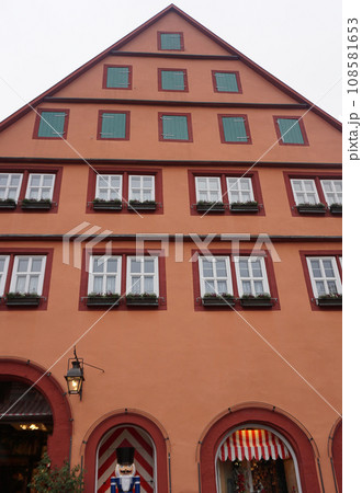 The facades of historical buildings at Rothenburg ob der Tauber where is the fortified city at Germany. 108581653
