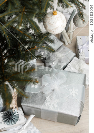 Gift boxes under the Christmas tree Gift boxes under the Christmas tree 108583054