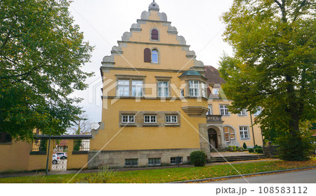 The fragment or detail of historical building at Rothenburg ob der Tauber where is the fortified city at Germany. 108583112