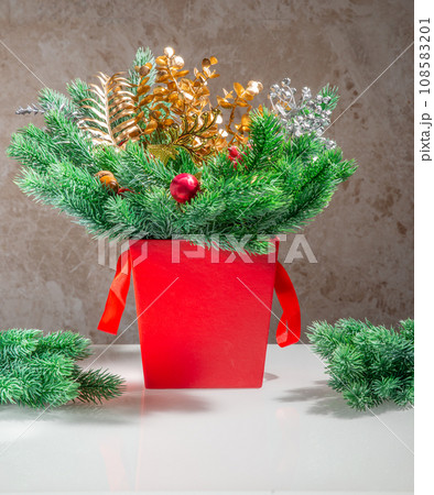 Layout of New Year's toys, accessories, gifts on a light wooden background. New Year background. 108583201