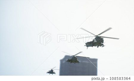 Yellow helicopter during a rescue operation in the city. 3d render Yellow helicopter during a rescue operation in the city. 3d render 108583364