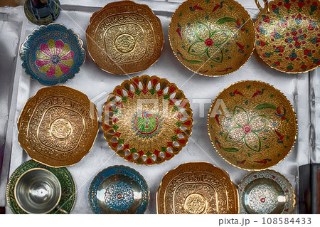Close-up of souvenirs at an open-air store located along the Siq Canyon in Petra, Jordan Close-up of souvenirs at an open-air store located along the Siq Canyon in Petra, Jordan 108584433