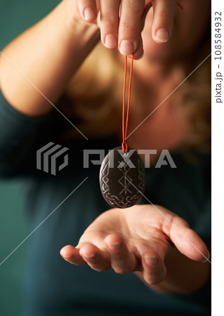 stone runic talisman for good luck in your hand 108584932
