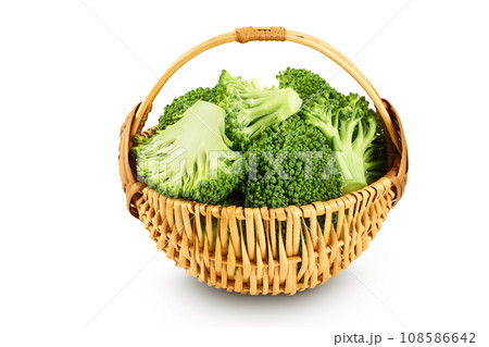 fresh broccoli in wicker basket isolated on white background close-up with full depth of field fresh broccoli in wicker basket isolated on white background close-up with full depth of field 108586642