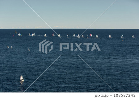 A lot of sail boats and yachts in the sea went on a sailing trip near port Hercules in Monaco, Monte Carlo, sail regatta, race 108587245