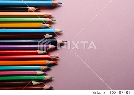 Color pencils set, row wooden color pencils isolated on pink background. colored pencils for drawing. copy space. Color pencils set, row wooden color pencils isolated on pink background. colored pencils for drawing. copy space. 108587501