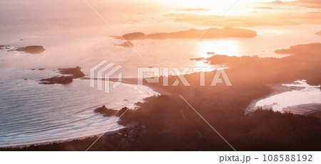 Rocky Shore on the Pacific Ocean Coast in Tofino, Vancouver Island, BC, Canada. Sunset. Aerial 108588192