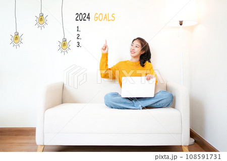 2024 goals with young woman pointing goals cheerful and happy new year 2024 goals with young woman pointing goals cheerful and happy new year 108591731