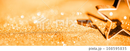 Sparkling Gold Defocused Bokeh Background with Star. Luxury Golden Background. Sparkling Gold Defocused Bokeh Background with Star. Luxury Golden Background. 108595835
