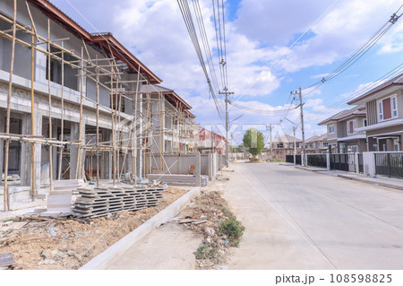 construction residential new house in progress at building site construction residential new house in progress at building site 108598825