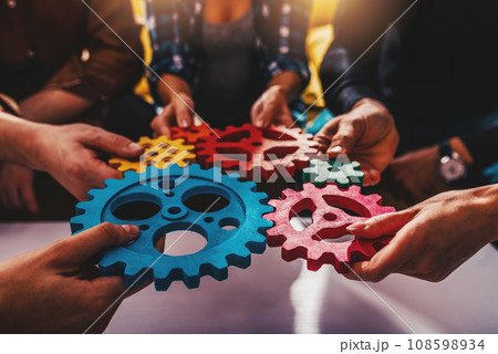 Business team work together and combine pieces of gears. Partnership and integration concept 108598934