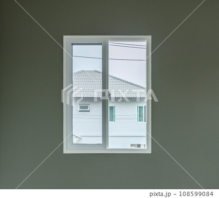 Glass window frame house interior on white wall 108599084