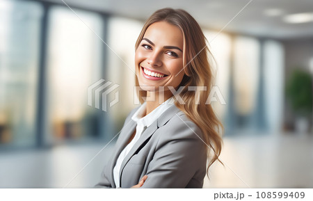 Smiling businesswoman in office 108599409