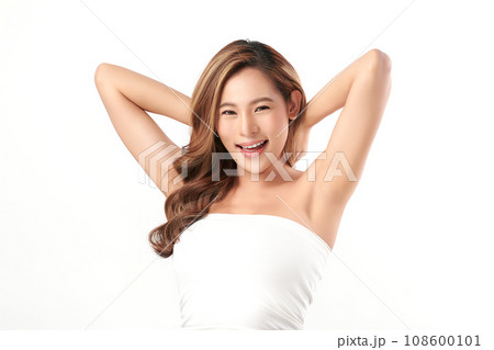 Beautiful Young Asian woman lifting hands up to show off clean and hygienic armpits or underarms on white background, Smooth armpit cleanliness and protection concept Beautiful Young Asian woman lifting hands up to show off clean and hygienic armpits or underarms on white background, Smooth armpit cleanliness and protection concept 108600101