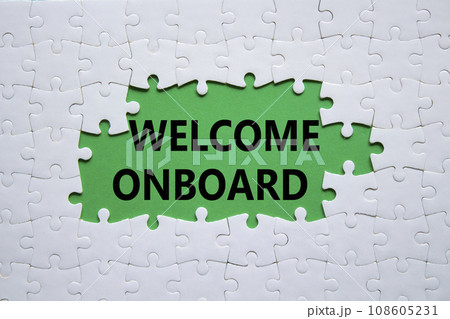Welcome onboard symbol. Concept words Welcome onboard on white puzzle. Beautiful green background. Business and Welcome onboard concept. Copy space. Welcome onboard symbol. Concept words Welcome onboard on white puzzle. Beautiful green background. Business and Welcome onboard concept. Copy space. 108605231