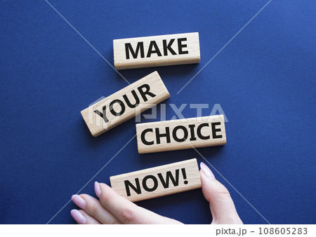 Make your Choice now symbol. Concept words Make your Choice now on wooden blocks. Beautiful deep blue background. Businessman hand. Business and Make your Choice now concept. Copy space. Make your Choice now symbol. Concept words Make your Choice now on wooden blocks. Beautiful deep blue background. Businessman hand. Business and Make your Choice now concept. Copy space. 108605283