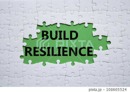Build resilience symbol. White puzzle with words Build resilience. Beautiful green background. Business and Build resilience concept. Copy space. Build resilience symbol. White puzzle with words Build resilience. Beautiful green background. Business and Build resilience concept. Copy space. 108605524