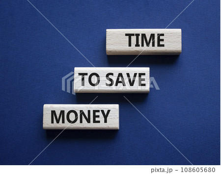 Time to save money symbol. Wooden blocks with words Time to save money. Beautiful deep blue background. Business and Time to save money concept. Copy space. Time to save money symbol. Wooden blocks with words Time to save money. Beautiful deep blue background. Business and Time to save money concept. Copy space. 108605680