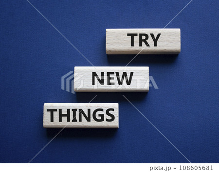 Try new Things symbol. Concept words Try new Things on wooden blocks. Beautiful deep blue background. Business and Try new Things concept. Copy space. Try new Things symbol. Concept words Try new Things on wooden blocks. Beautiful deep blue background. Business and Try new Things concept. Copy space. 108605681