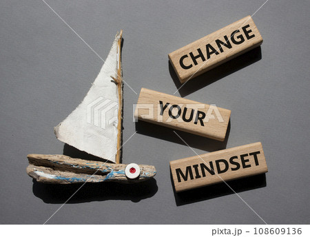 Change your mindset symbol. Concept words Change your mindset on wooden blocks. Beautiful grey background with boat. Business and Change your mindset concept. Copy space. 108609136