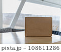 Copy-space box on table against background of cloudy autumn day 108611286