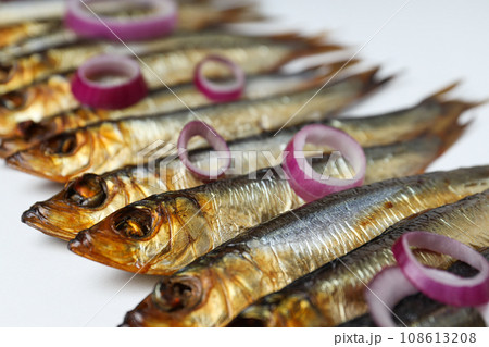 Concept of tasty food - delicious smoked fish 108613208