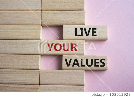 Live your values symbol. Concept words Live your values on wooden blocks. Beautiful pink background. Business and Live your values concept. Copy space. Live your values symbol. Concept words Live your values on wooden blocks. Beautiful pink background. Business and Live your values concept. Copy space. 108613928